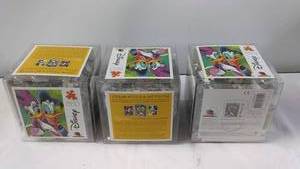 lot 157 image: 3 Disney 850 Piece Jigsaw Puzzle & Art Poster - Featuring Duck Characters