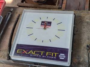 lot 53 image: NAPA Exact Fit Wiper Blades Wall Clock