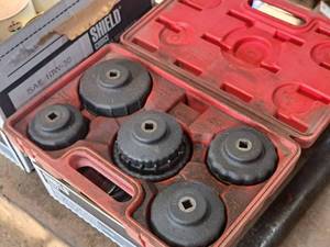lot 55 image: Assorted Oil Filter Change Caps with Plastic Case