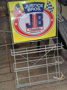 lot 93 image: Justice Bros. logo Metal Display Rack