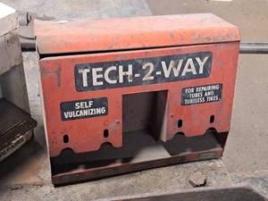 lot 95 image: Vintage Tech-2-Way Metal Tire Tube Dispenser