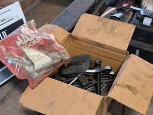 lot 114 image: Steering Wheel Puller with Extra Parts