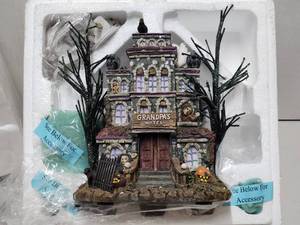 lot 185 image: Brand New THE MUNSTERS Halloween Village Building - Grandpas Touch of Transylvania Hotel