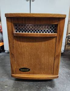 lot 194 image: Working SUNHEAT Rolling Space Heater