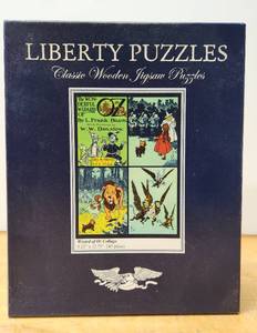 lot 257 image: Quality Complete LIBERTY Wooden Jigsaw Puzzle - Wizard of Oz Collage - 245 Pieces
