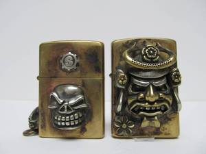 lot 35 image: Great Looking Unique Brass & Silver Lighters wSkull & Warrior Mask