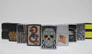 lot 37 image: Lot of 9 Assorted ZIPPO Lighters