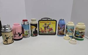 lot 137 image: Lot of Assorted Vintage Thermoses & Yogi Bear Lunchbox