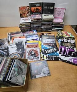 lot 391 image: HUGE Lot of Mostly New Sealed RockMusic Festival Sample Cds & More - South by Southwest & others