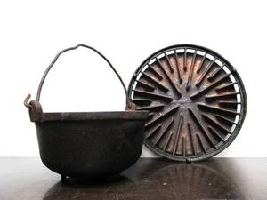 lot 250 image: Vintage Cast Iron Stove Top Grate and Small Handled Pot
