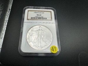 1988 American Silver Eagle NGC MS69 - NGC Price Guide for an MS69 is $65