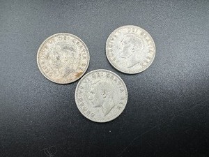 Three Earlier Date Silver Canadian Quarters (.45 Oz. of Silver) 1949, 1950, and 1952.