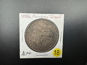 1886 Rainbow Toned Morgan Silver Dollar Marked AU When Purchased