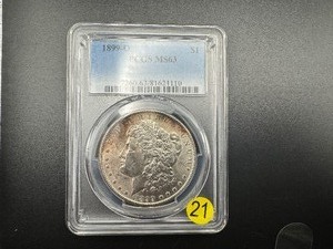 1899-O Nicely-Toned Silver Morgan Dollar PCGS MS63 PCGS Price Guide is $90