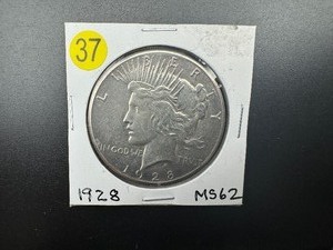 Key Date 1928 Peace Dollar Marked MS62 When Purchased  - PCGS Price Guide for aan MS62 is $750