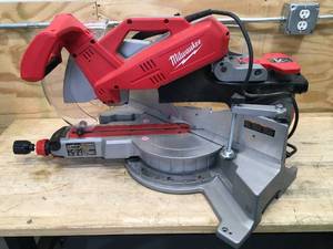 lot 5 image: Milwaukee 12 Sliding Compound Miter Saw Model # 6955-20