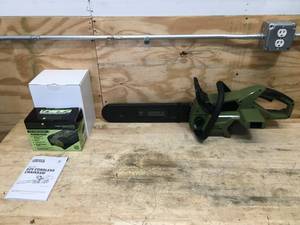 lot 8 image: Green Machine Cordless Chainsaw Model # GMCS6200