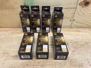 lot 89 image: GE Lot of 7-  Vintage Style LED Light Bulbs, 25 Watt, Amber Finish, Decorative Bulbs, Small Base