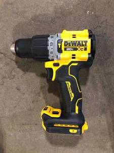 lot 12 image: DEWALT 20V Compact Cordless 12 in. Hammer Drill (Tool Only)     Customer Returns See Pictures