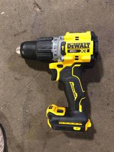 lot 38 image: DEWALT 20V Compact Cordless 12 in. Hammer Drill (Tool Only)  Customer Returns See Pictures