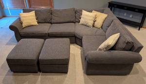 lot 3 image: Pottery Barn Charcoal Sectional and Storage Ottomans