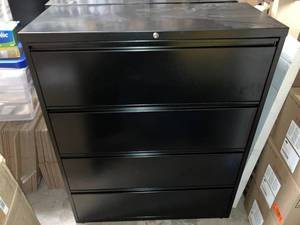 lot 10 image: Four Drawer Lateral File Cabinet