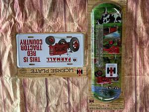 lot 61 image: New International Harvester IndoorOutdoor Thermometer & License Plate