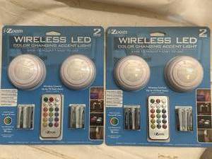 lot 93 image: Lot of 2 Packs of 2 New Wireless Remote Puck Lights
