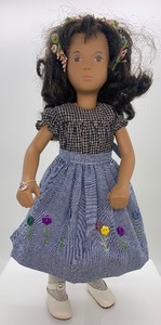 lot 213 image: Vintage SASHA Doll - Girl 1976, Navy Checked Full Skirt with Floral Accents