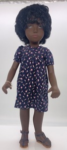 lot 91 image: Vintage SASHA Doll - #118- CORA FLOWER DRESS Girl, Navy Dress with Pink Flowers