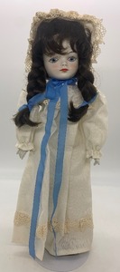 lot 69 image: Vintage GOTZ Porcelain Doll - Brunette Sitting Doll