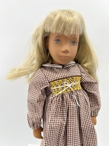 lot 212 image: Vintage SASHA Doll - Girl 1976, Brown and White Checked Dress