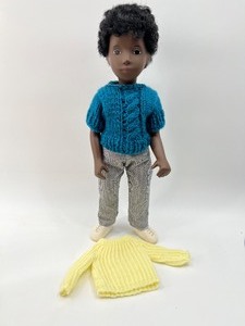 lot 125 image: Vintage SASHA Doll - #318 - Caleb Gregor Doll, Boy, Teal and Yellow Sweaters