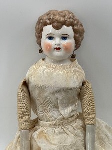 lot 80 image: Antique Molded Brown Hair with Earrings Doll