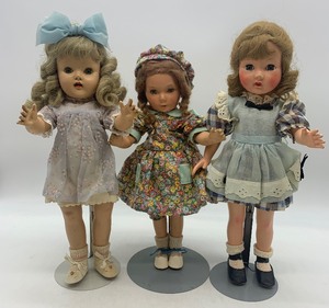 lot 140 image: Vintage Hard Plastic Dolls Including a Composition Doll