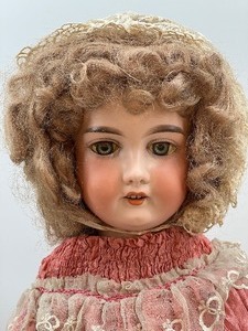 lot 233 image: Antique Bisque Doll - ARMAND MARSEILLE - 390 - Germany - Pink Dress