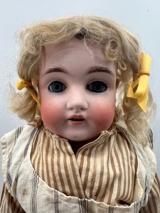 lot 303 image: Antique Bisque Doll - Dep - Striped Dress