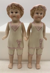 lot 292 image: Pair of Reproduction Molded BISQUE Dolls