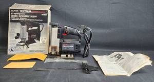 lot 35 image: Sears Craftsman 13 HP Auto Scroller Saw with Blades and Accessories