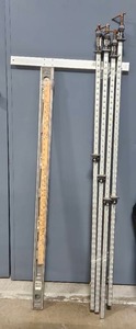 lot 123 image: Set of 4 Metal Adjustable Clamps with Leveling Tool