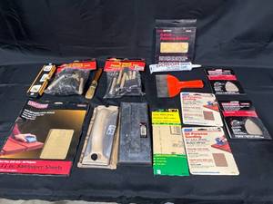 lot 254 image: Collection of Craft and Home Improvement Supplies Including Sandpaper Sheets, Brushes, and Polishing Bonnets