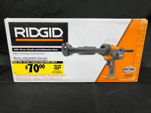 lot 257 image: RIDGID 18V 10 oz. Caulk and Adhesive Gun Tool Only