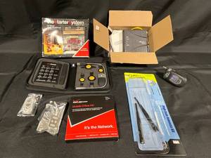 lot 276 image: Lot of Verizon Mobile Office Kit, High Gain Antenna Kit, DSL Modem, and Accessories