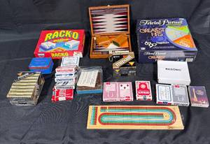 lot 294 image: Vintage Game Collection Including Trivial Pursuit, Rack-O, and Assorted Playing Cards