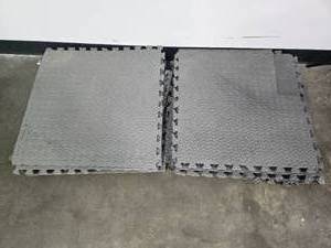 lot 75 image: Set of 12 Interlocking Grey Foam Floor Mats