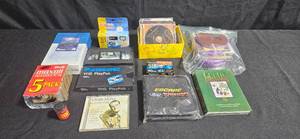 lot 154 image: Mixed Lot of VHS Tapes, CDs, Film, and Camera Supplies