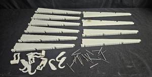 lot 155 image: Lot of 10 Plastic Shelf Brackets with Hardware