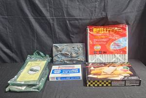 lot 164 image: Mixed Lot of Home and Car Maintenance Items - Air Filters, Car Care Kit, and Decorative Panel