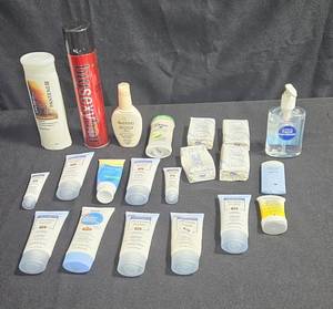 lot 185 image: Assorted Skincare and Hair Care Products Lot including Sunscreen, Shampoo, and Moisturizers