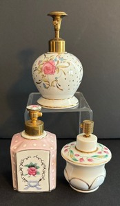lot 149 image: Three Vintage Hand Painted Perfume Bottles by Trice & Lady Fair